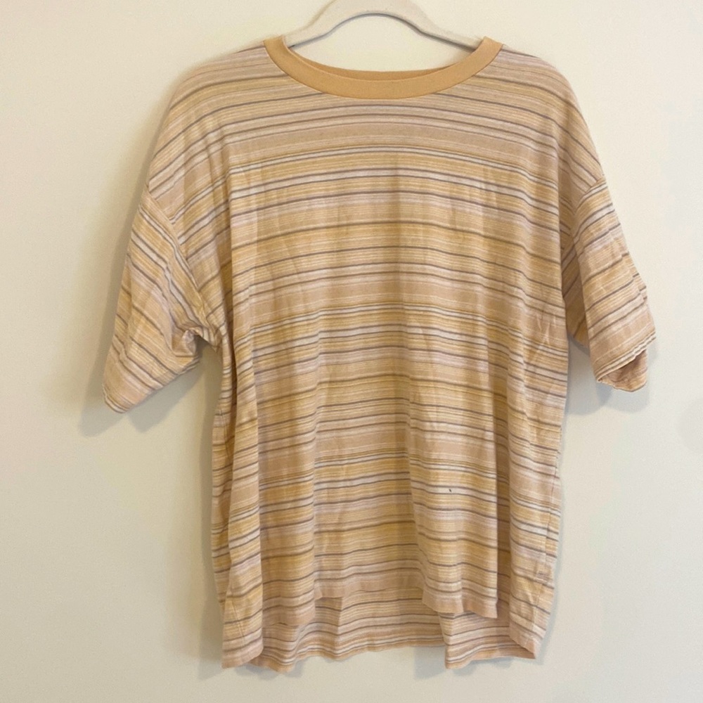 Yellow, white, and grey BOG tee.